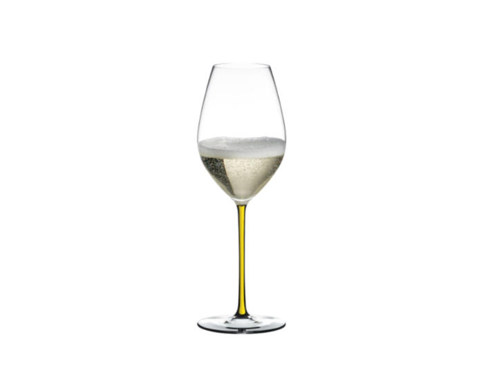 Champagneglass med gul stilk, og klar klokke og stett